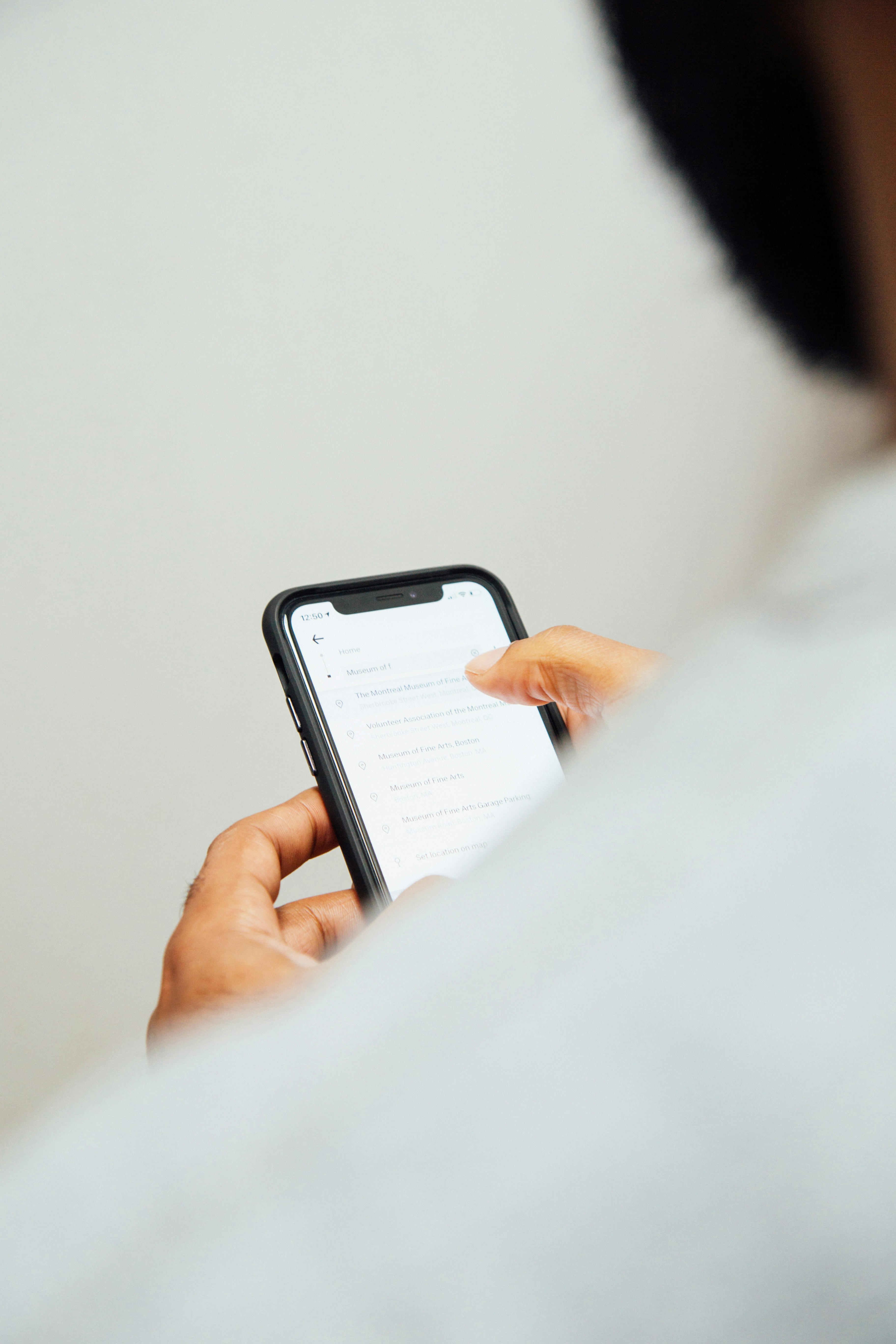 A man browsing the internet on his phone